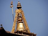 03 Kathmandu Gokarna Mahadev Temple Very Top Has A Trident, Bell, Canopy and Bird 